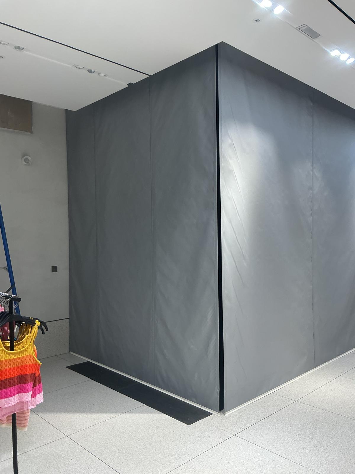 Fire curtain descended across a corridor opening