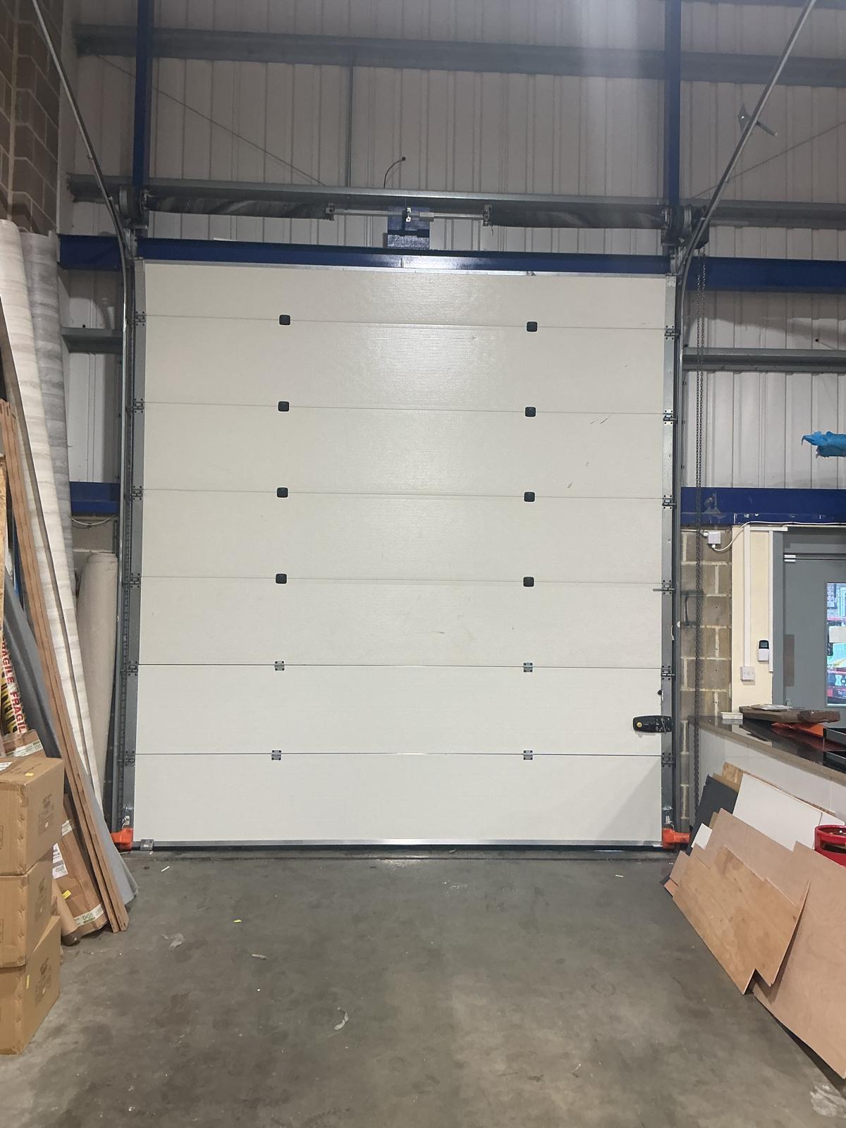 Sectional door panels seen from inside the unit