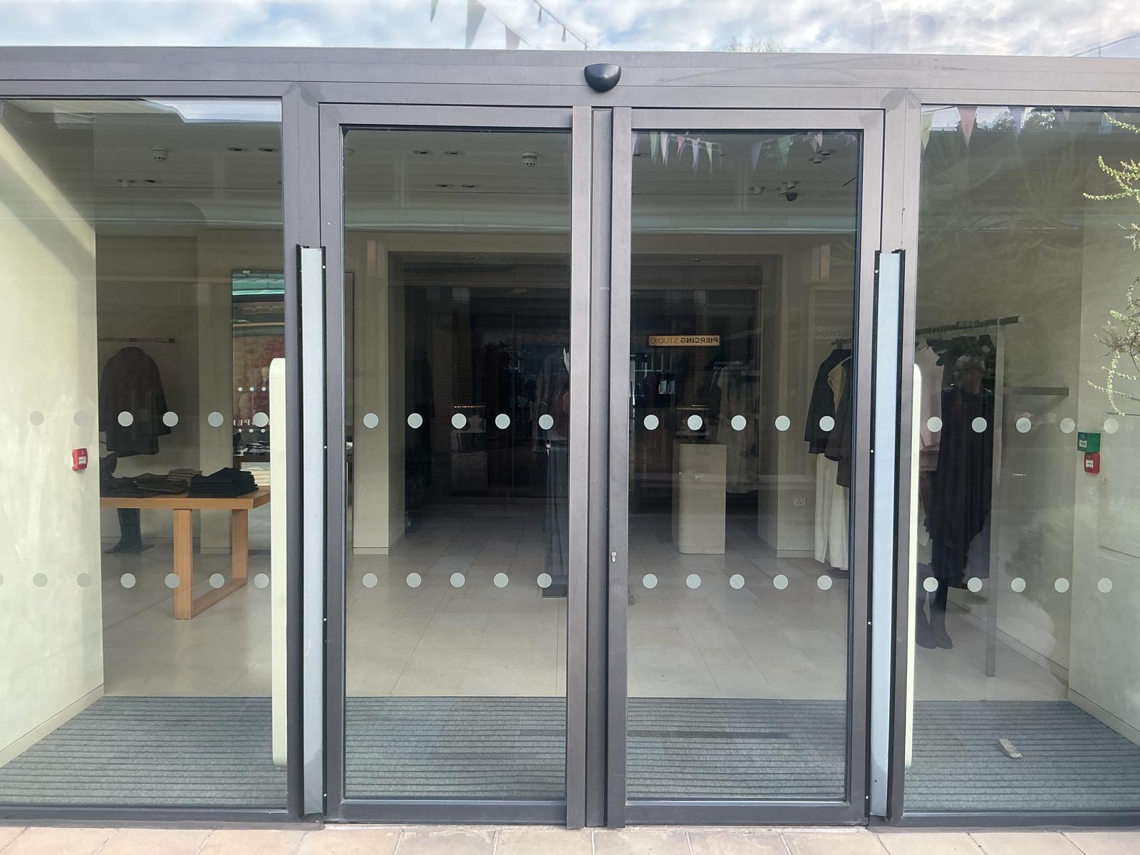 Glazed shopfront with the shutter box installed above the opening