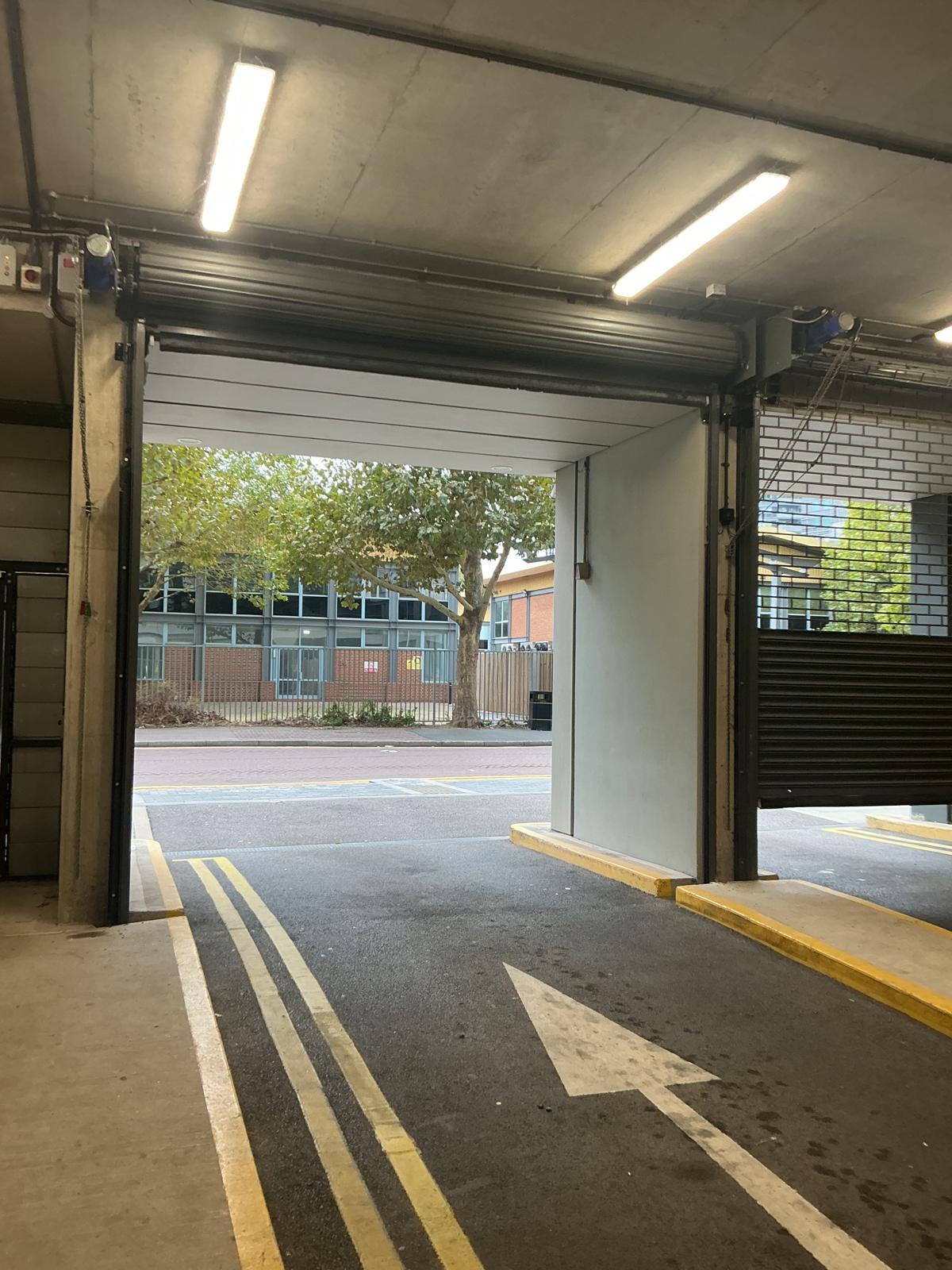 Shuttered service entrance viewed from the street